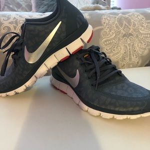 Grey Nike 5.0 women’s shoe, cheetah